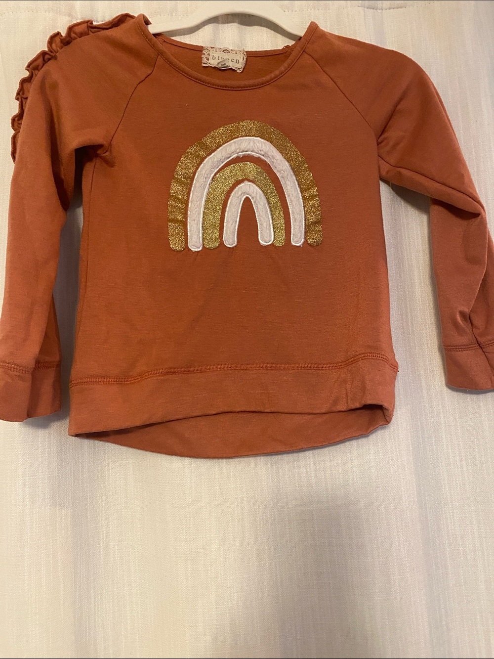 btween Rust Pullover Sweatshirt with Gold and Cream Rainbow
